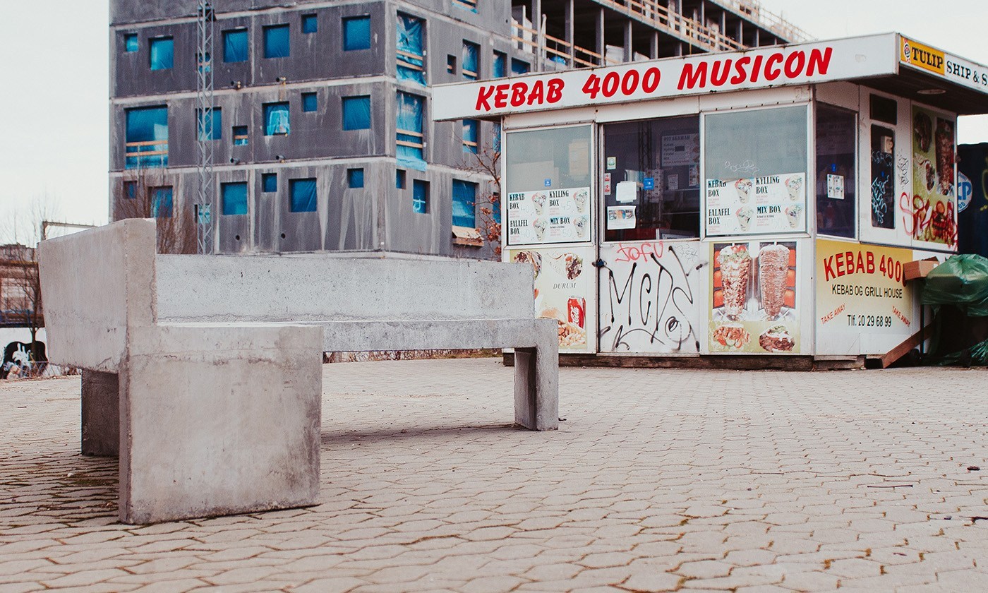 A bench made from recycled concrete slabs stands in front of an ongoing construction project in Musicon, a district in Roskilde, Denmark. PHOTO BY SEBASTIAN SKOV ANDERSEN